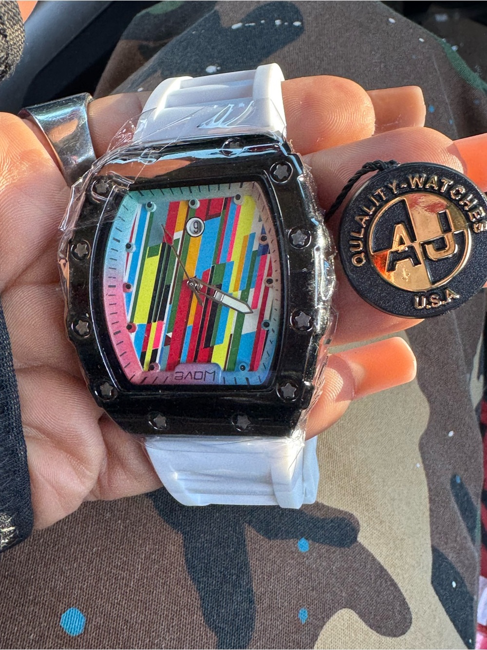 White-Strap Smartwatch with Vibrant Multicolor Dial